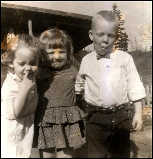 Larry with sister and cousin, 1959