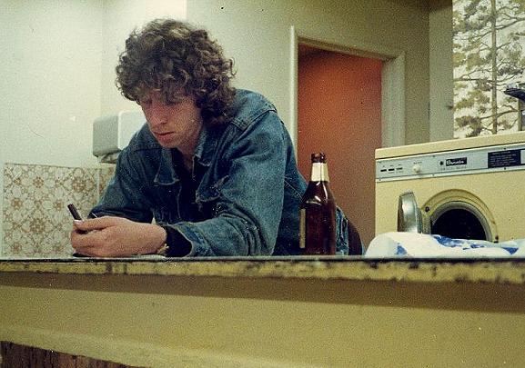 Larry at laundromat, California, 1982